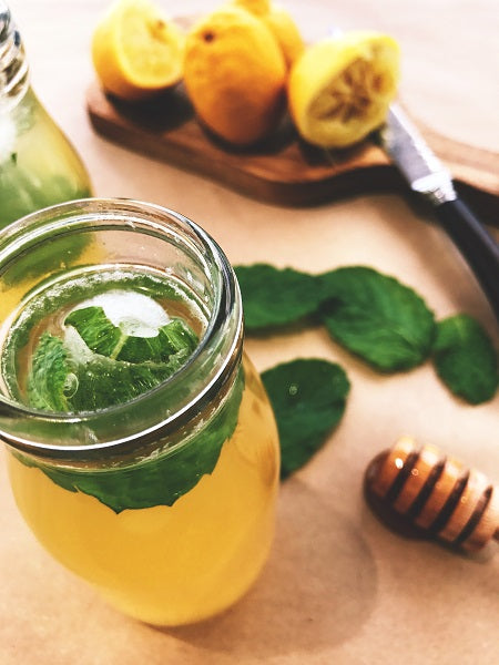 Homemade lemon, honey and mint refresher